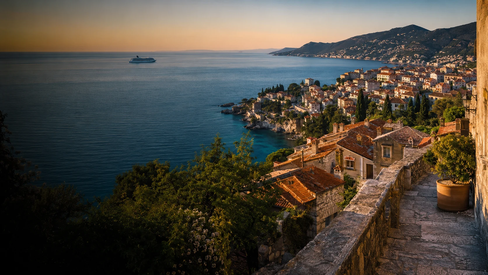 Terracotta rooftops overlooking the Mediterranean coastline
